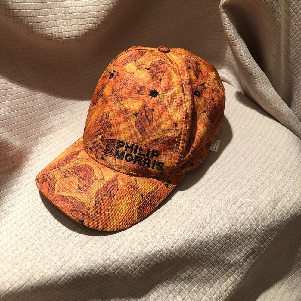 Philip Morris USA women orange with leafy print baseball cap